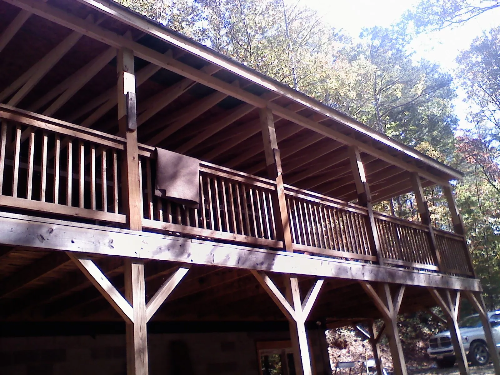 Timber framing under a new elevated porch and deck — Roof Leak Repair in Southport by Roofing Brothers